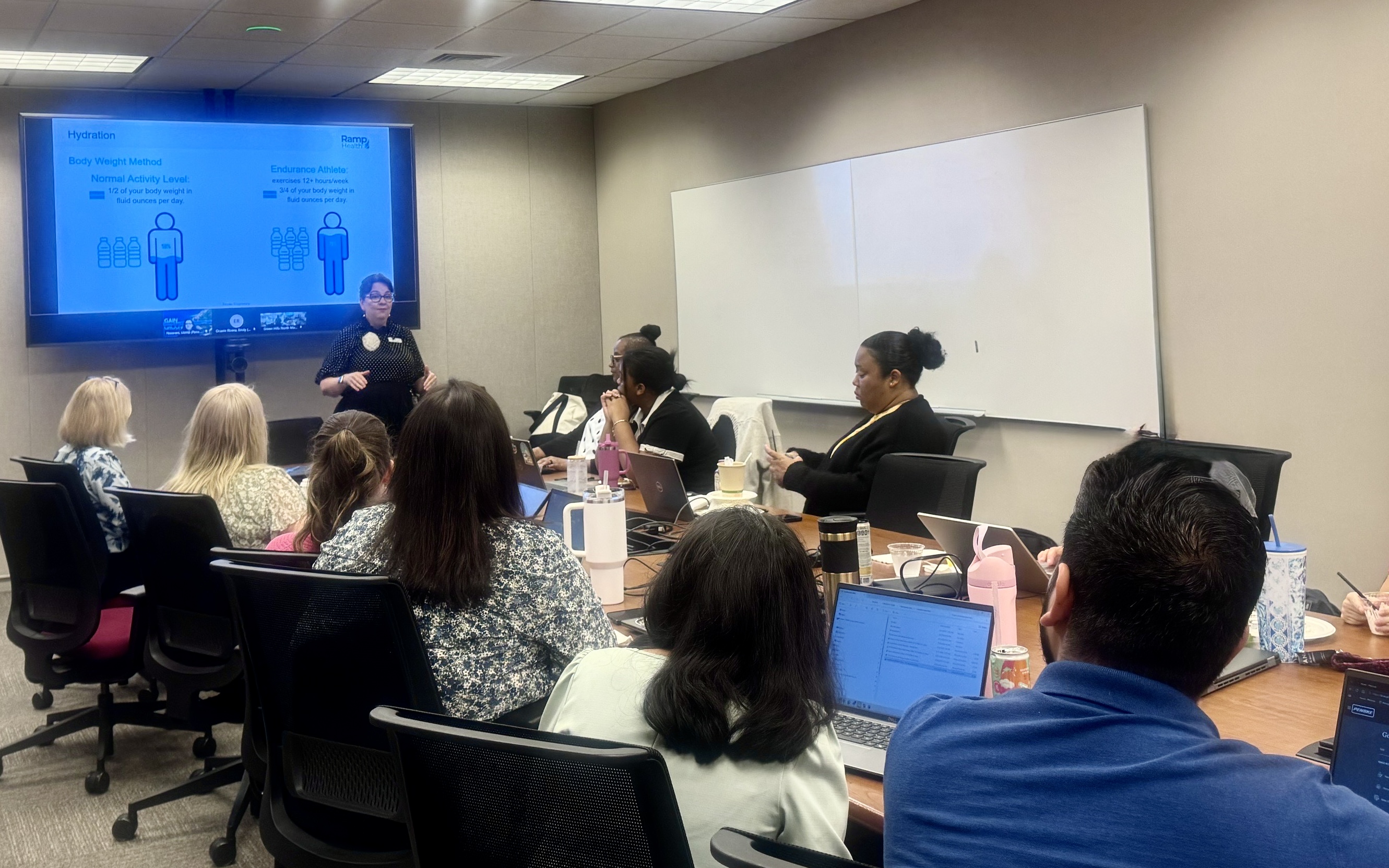 Holly speaking to a corporate team
